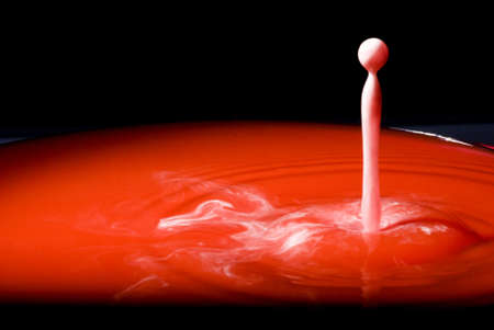 White-Red water splashの写真素材