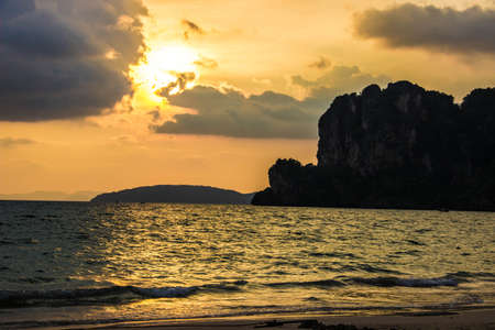 Sunset on a sandy beach  の写真素材