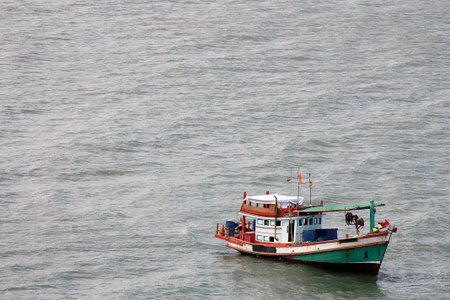 BOAT ON THE  SEA WATERの写真素材