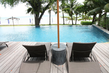 Edge of swimming pool and bed beachのeditorial素材