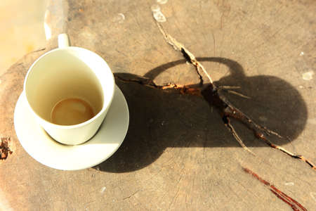 coffee cup on the wooden tableの写真素材