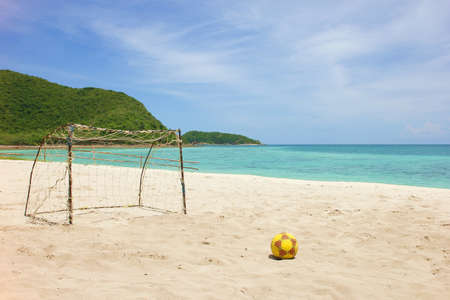 football on the white sand beach at Island,Thailandの写真素材