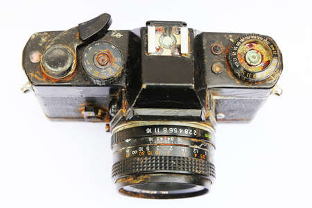 Old  SLR film camera  corrode   isolated on white background  の写真素材
