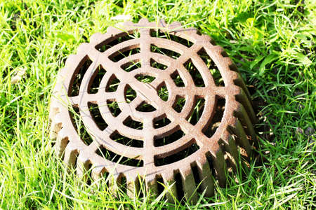 Drain on lawnsの写真素材