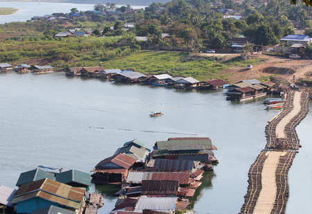 small village and riverside Sangkaburi Thailandの写真素材