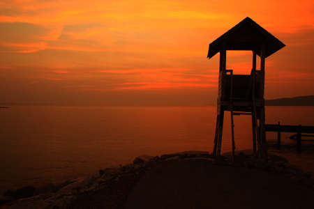 lighthouse with the sunsetの写真素材