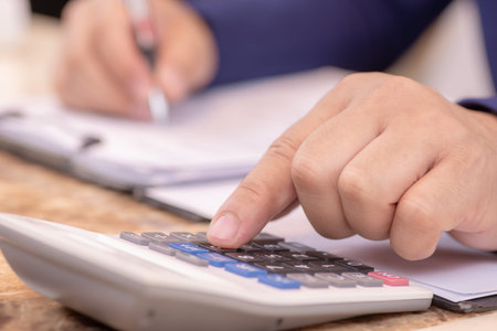 Hand Using Calculator