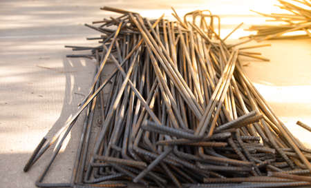 Reinforcement steel rod and deformed bar with rebar at construction site.の写真素材