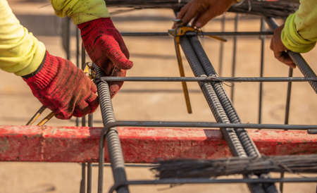 Reinforcement steel rod and deformed bar with rebar at construction site.の写真素材
