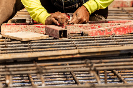 Reinforcement steel rod and deformed bar with rebar at construction site.