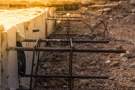 Reinforcement steel rod and deformed bar with rebar at construction site.の写真素材