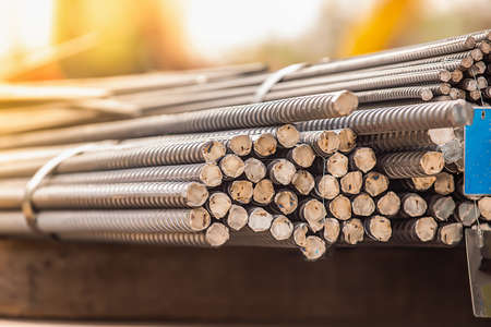 Reinforcement steel rod and deformed bar with rebar at construction site.の写真素材