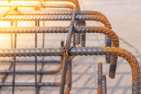 Reinforcement steel rod and deformed bar with rebar at construction site.の写真素材
