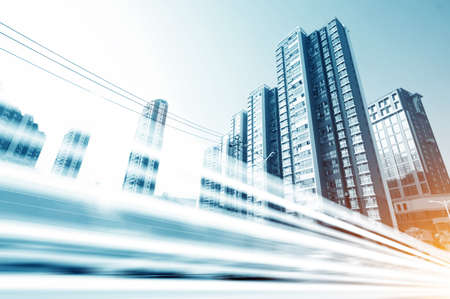 the light trails on the modern building background in shanghai china  の写真素材