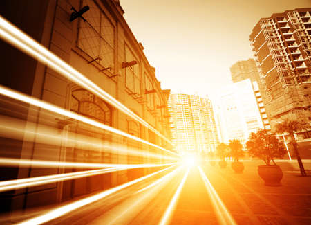 the light trails on the modern building background in shanghai china. の写真素材