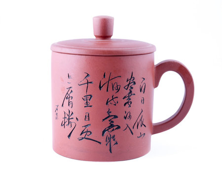Chinese teapot made of zisha clay isolated on white, clipping path includedのeditorial素材