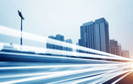 the light trails on the modern building background in shanghai china.の写真素材
