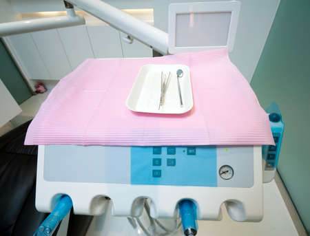 Dental tools on a dentistの写真素材