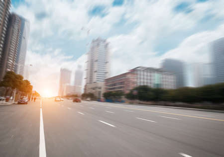 road in city with sunset 
の写真素材