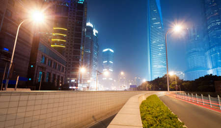 the light trails on the modern building background in shanghai china  の写真素材