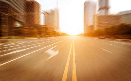 road in city with sunsetの写真素材