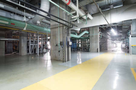 Equipment, cables and piping as found inside of a modern industrial power plantのeditorial素材