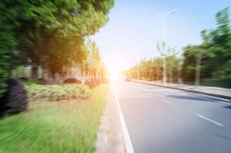 road in city with sunsetの写真素材