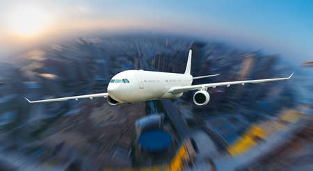 the airplane away from the city,abstract backgroundの写真素材