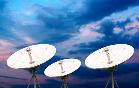 satellite dish antennas under skyの写真素材