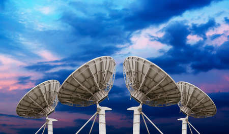 satellite dish antennas under skyの写真素材