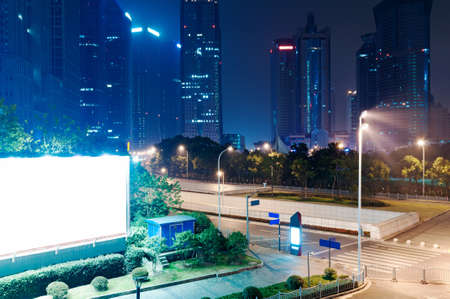night view of modern street in shanghai financial districtの写真素材