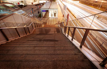 moving car with blur light through city at nightの写真素材