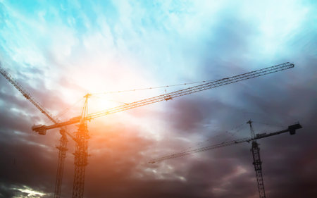 construction equipment and elements of a building under construction at Sunset