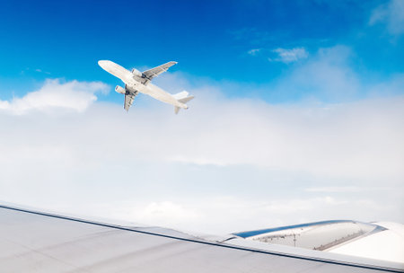 Large passenger plane flying in the blue sky