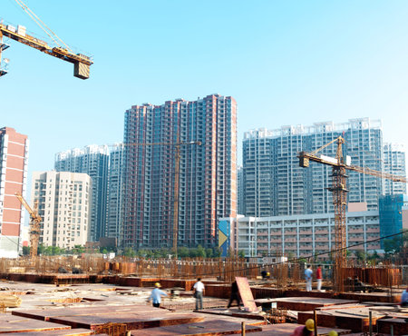 building under construction with workers