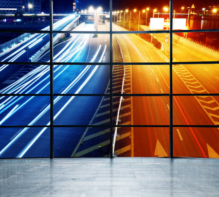 Highway light trails, modern city at night  