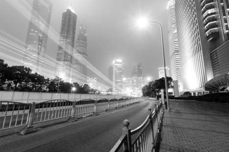 the light trails on the modern building background in shanghai china  の写真素材