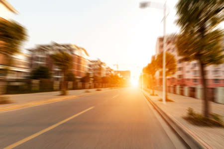 road in city with sunsetの写真素材