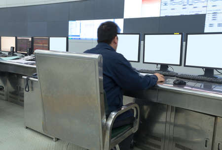 Modern plant control room and computer monitorsの写真素材