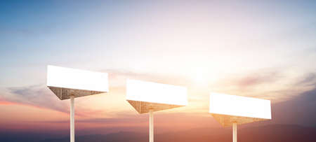 Blank billboard with space for your advertisement against blue skyの写真素材