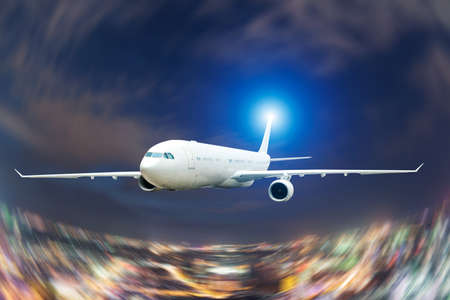 Large passenger plane flying in the  skyの写真素材