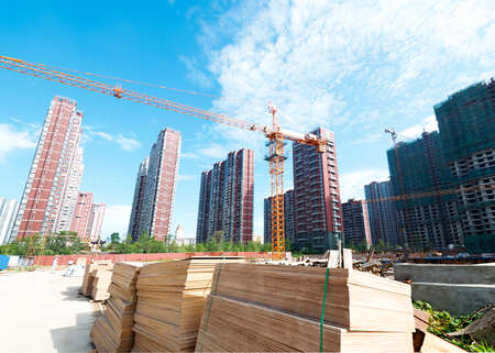 multiple cranes working on huge construction siteのeditorial素材