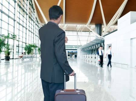 Business man at airportのeditorial素材