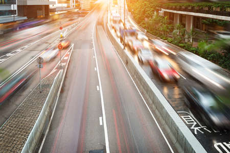 Car traffic against the sunset の写真素材