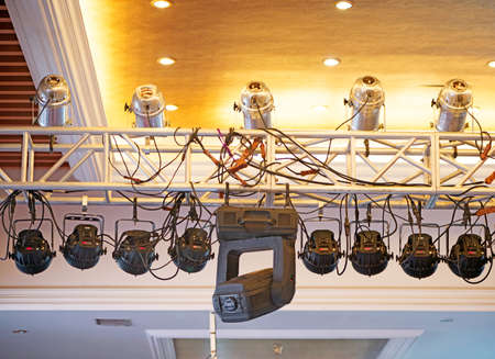 Studio lighting equipment high above an outdoor theatrical performance.の写真素材