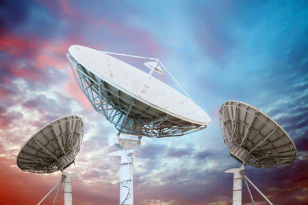 satellite dish antennas under sky