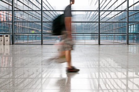 people silhouette in hall of office building 
