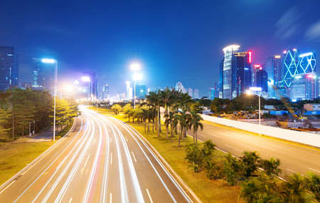 light trails on the street at dusk in guangdong,Chinaの写真素材