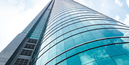 Modern business building with sky reflectionのeditorial素材