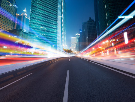 Asphalt road and modern city